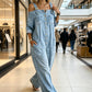 👗👖 Cold-shoulder jumpsuit med vida ben och fickor